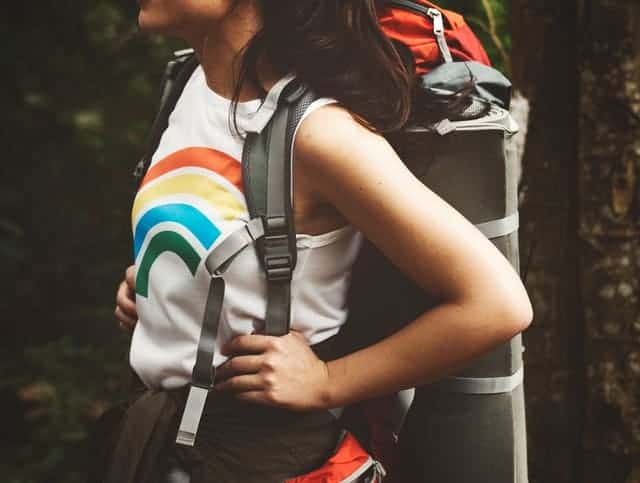 a woman with a hiking backpack