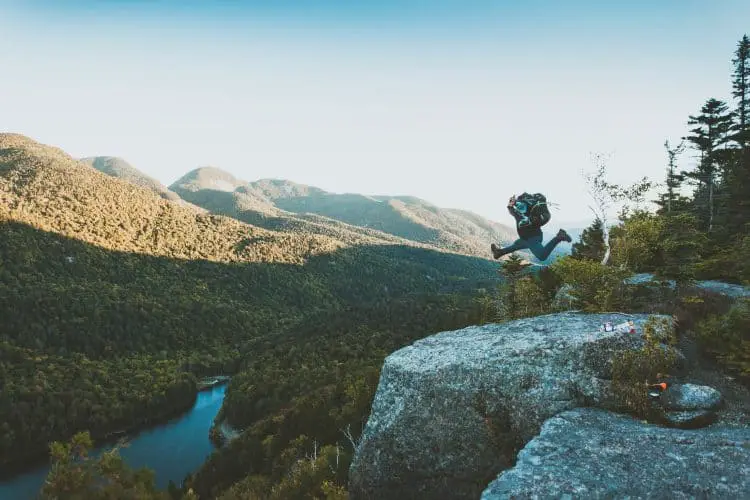 jumping hiker