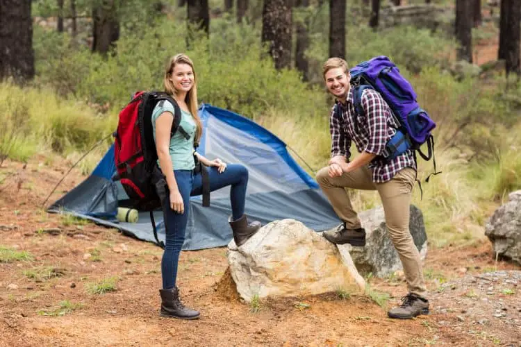 couple camping and hiking
