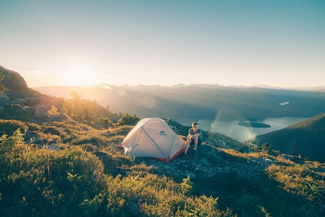 hiker with a tent