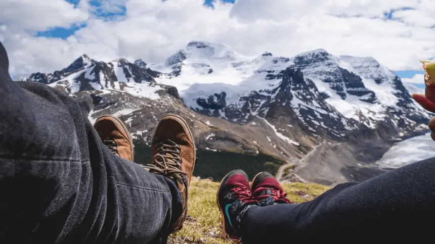 hiking boots on a mountain background