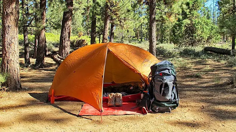 sleeping pad and a tent