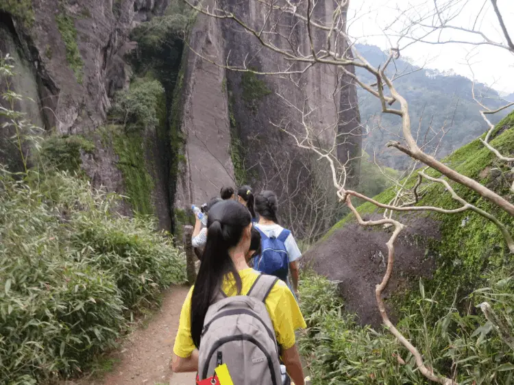 a group of backpackers on a trail