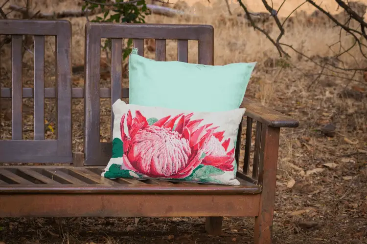a pillow on a bench