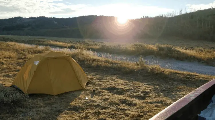 a yellow camping tent