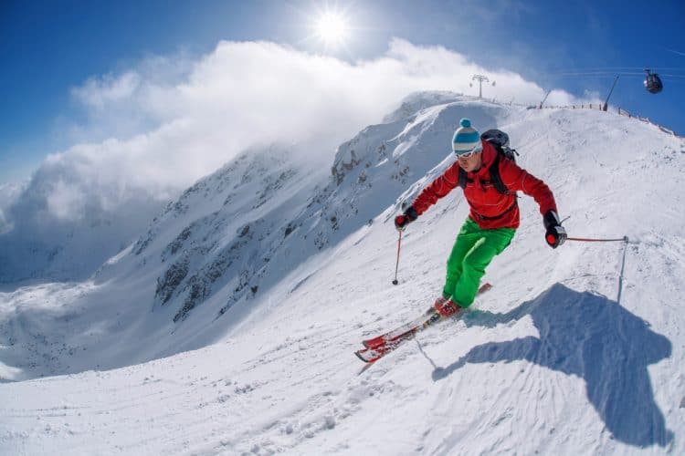 man skier skiing in the mountains