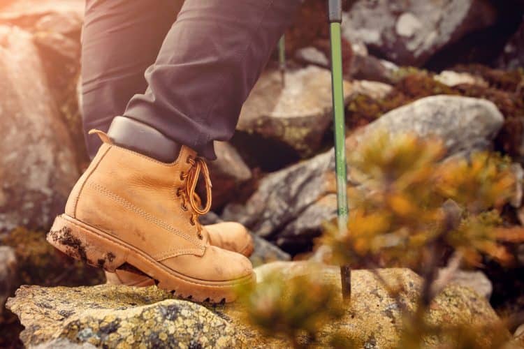 hiking boots on the rock in the mountains.