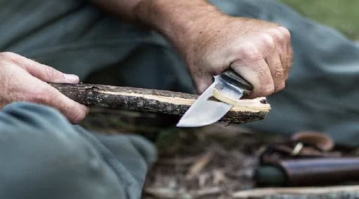 Building Camp with Knife