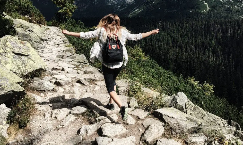 woman walking in the mountains