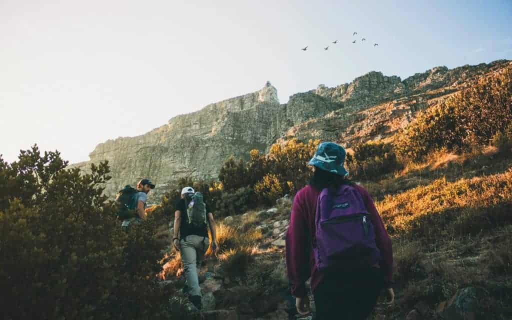 people hiking with jansport backpacks for hiking
