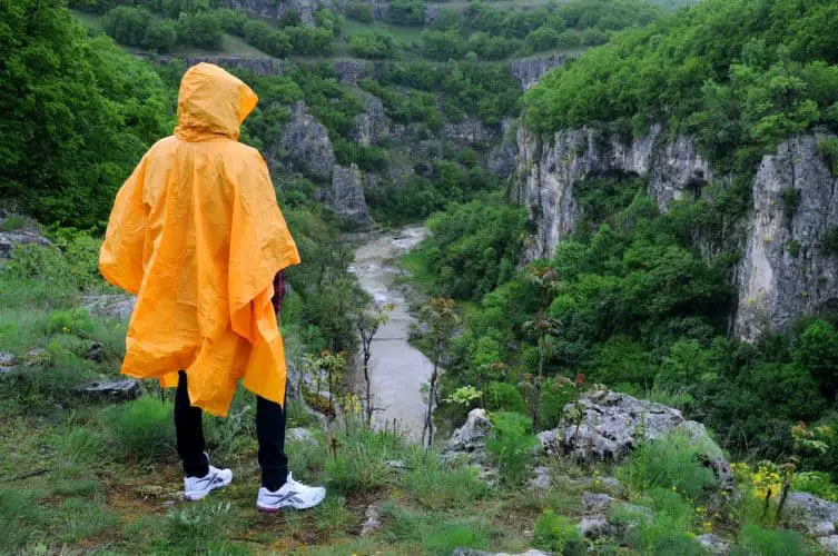 woman in yellow rain poncho