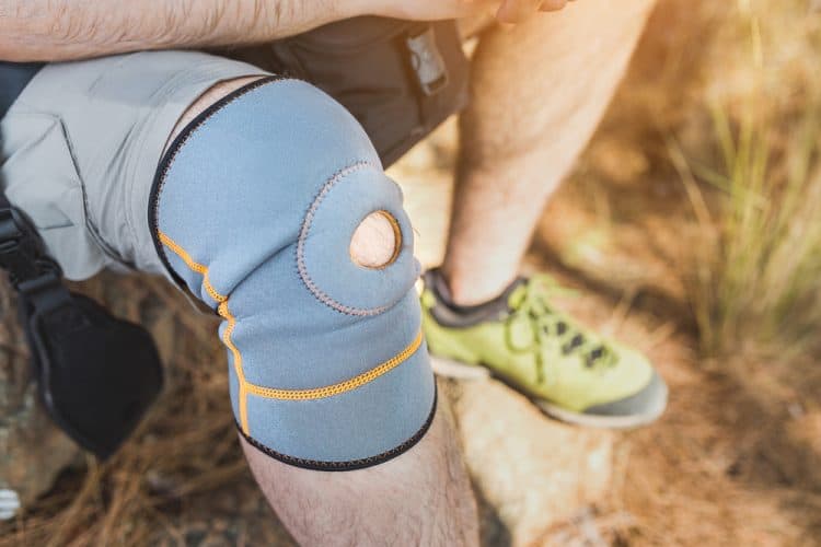 hiker wearing a knee brace