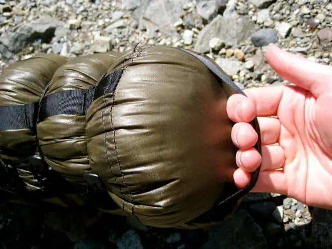 a compression sack with a handler